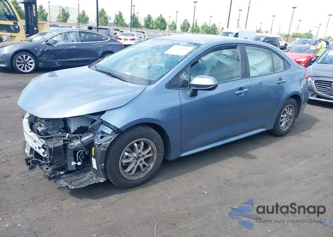 2022 Toyota Corolla Hybrid Le z USA, uszkodzony, nr VIN JTDEAMDE9NJ057489